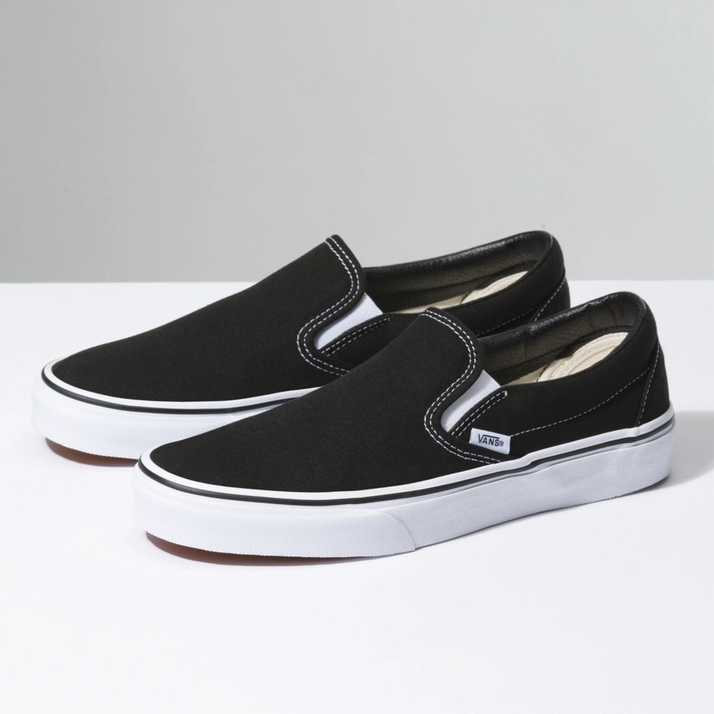 Vans Black slip ons